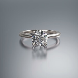 Platinum  4-Claw Solitaire Round Diamond Ring