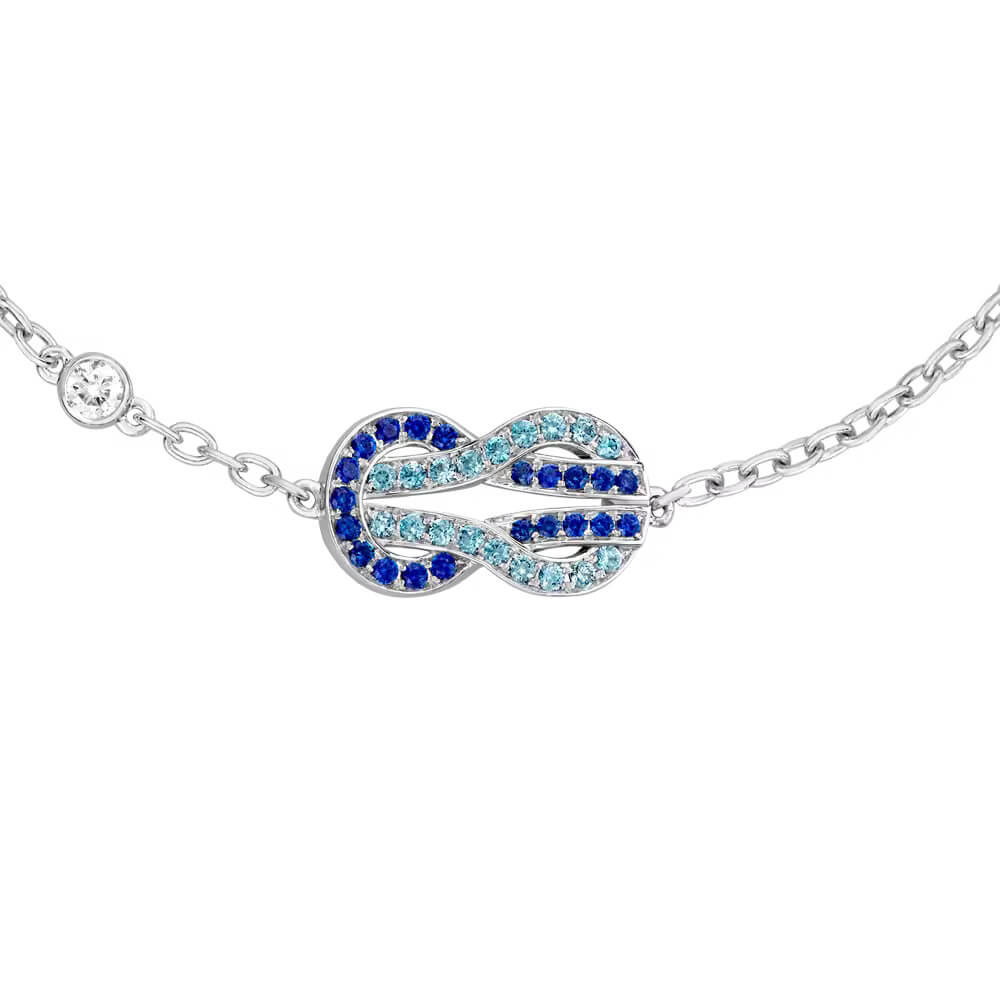 Bracelet FRED Chance Infinie Moyen Modèle en or blanc, saphirs, topazes et diamant