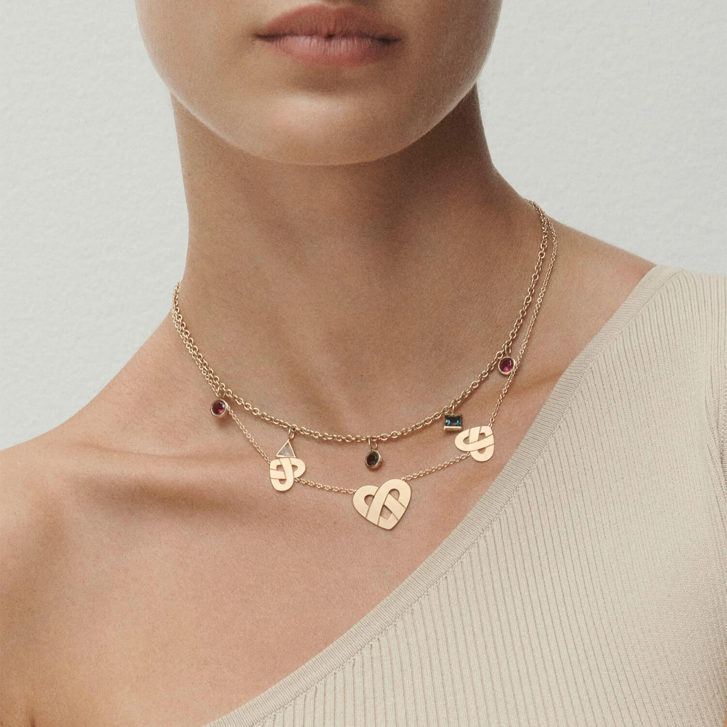Collier Poiray Lolita en or jaune, rhodolites, topaze blue London, quartz fumé et pierre de lune