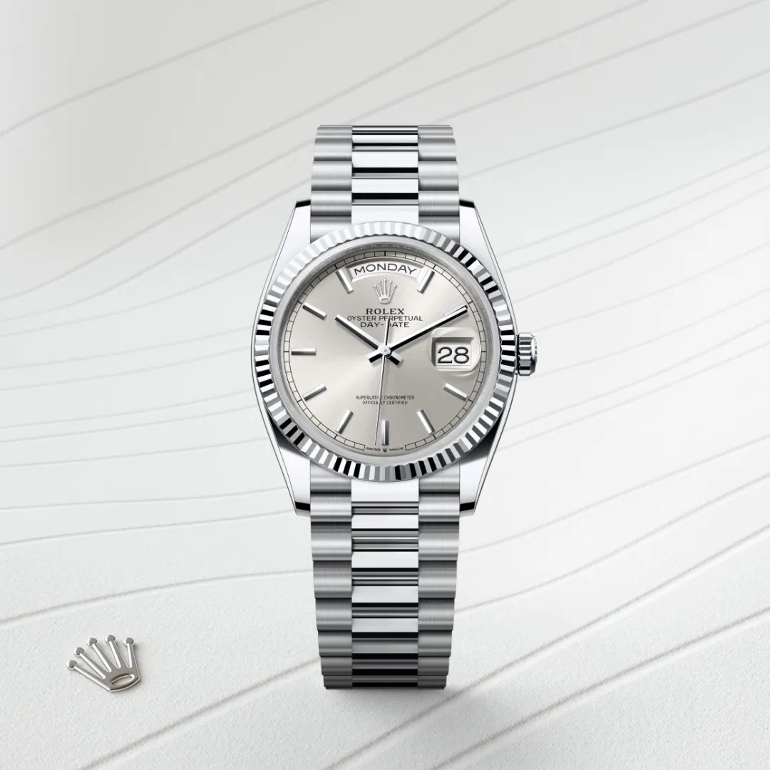 Rolex Day-Date 36 en Platine M128236-0001 chez Maison Prieur