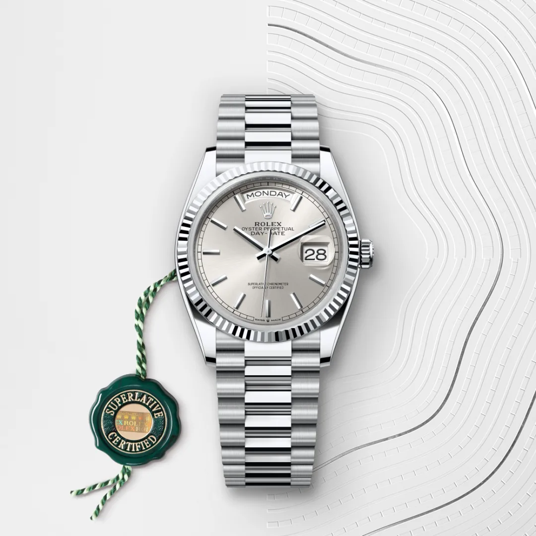 Rolex Day-Date 36 en Platine M128236-0001 chez Maison Prieur