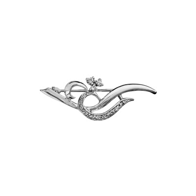 Broche en argent rhodié et pierres blanches