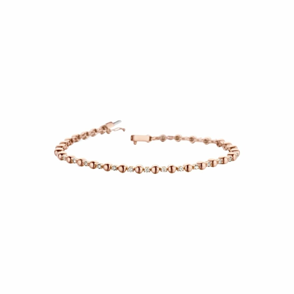 Bracelet motif en or rose et diamants de 0.63ct