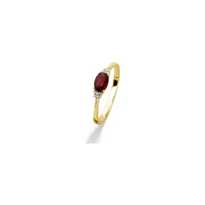 Bague en or jaune, rubis et diamant