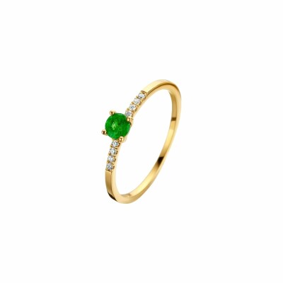 Bague avec motif en or jaune, émeraude et diamants de 0.05ct