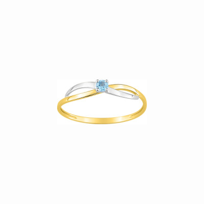 Bague en or jaune, rhodium et topaze