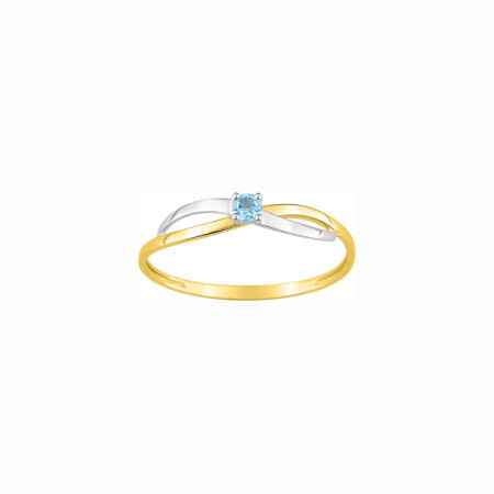 Bague en or jaune, rhodium et topaze