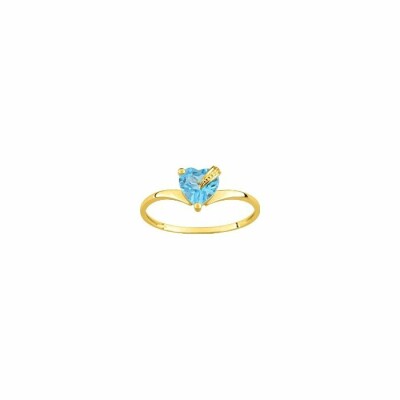 Bague en or jaune et topaze bleue