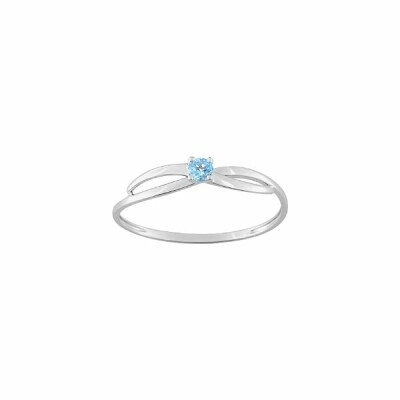 Bague en or blanc et topaze bleue