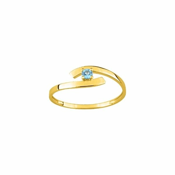 Bague en or jaune et topaze bleue