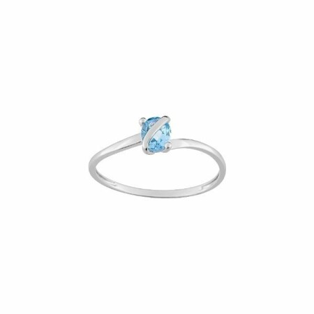 Bague en or blanc et topaze bleue