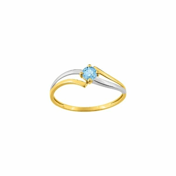 Bague en or jaune, or blanc et topaze bleue