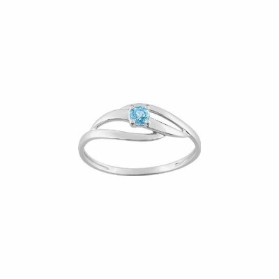 Bague en or blanc et topaze bleue