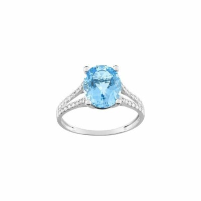 Bague en or blanc, oxydes de zirconium et topaze bleue