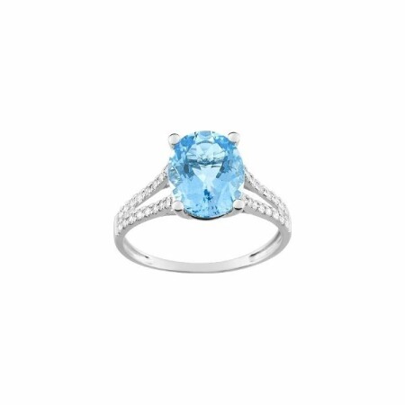 Bague en or blanc, oxydes de zirconium et topaze bleue