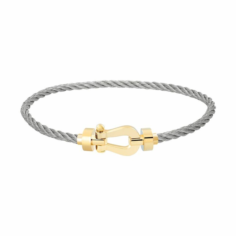 Bracelet FRED Force 10 moyen modèle manille en or jaune et câble en acier 