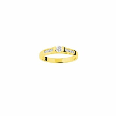 Solitaire accompagné en or jaune et diamants de 0.23ct