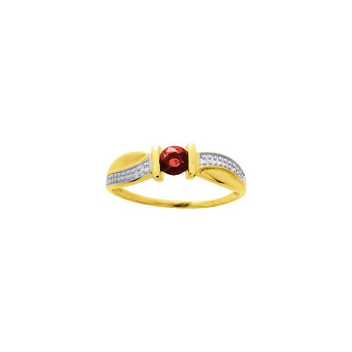 Bague en or jaune, rhodium et rubi