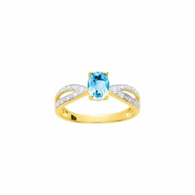 Bague en or jaune, topaze bleue et oxyde de zirconium