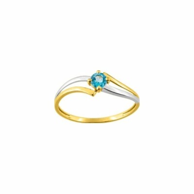 Bague en or blanc et or jaune et topaze bleue