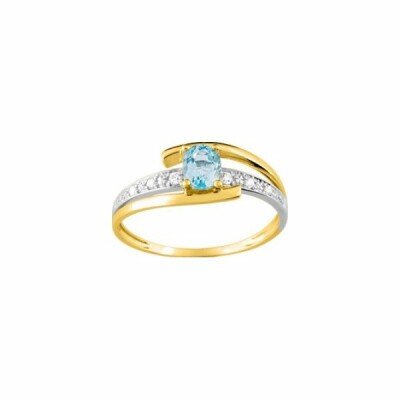 Bague en or jaune, or blanc et topaze bleue