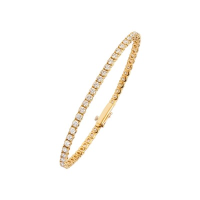 Bracelet rivière de 56 diamants en or jaune. Poids total des diamants : 4,50 cts en qualité GSI