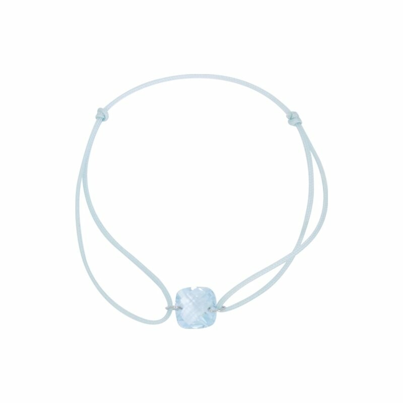 Bracelet sur cordon en or blanc et topaze bleue