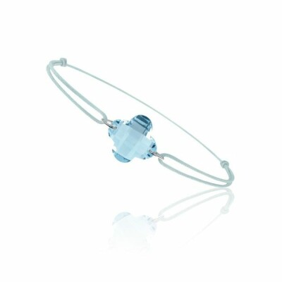 Bracelet sur cordon en or blanc et topaze bleue