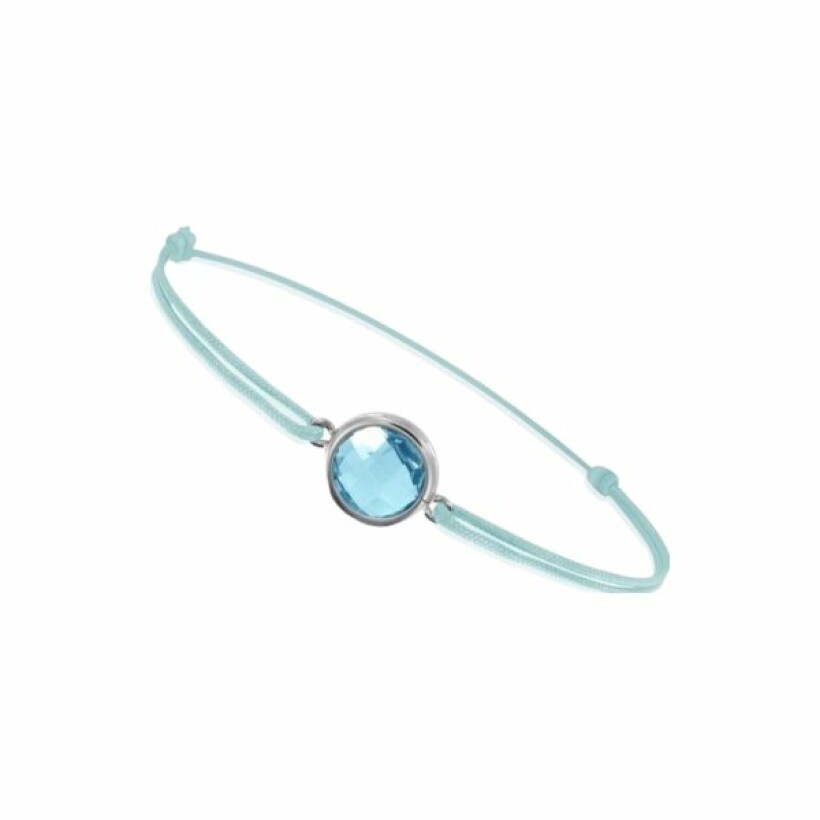 Bracelet sur cordon en or blanc et topaze bleue