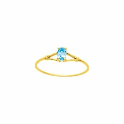 Bague en or jaune et topaze bleue