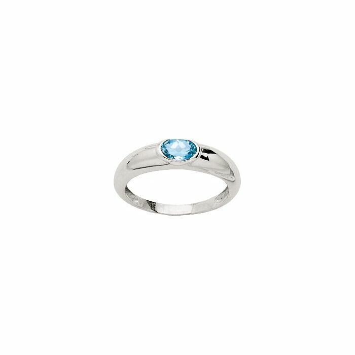 Bague en or blanc et topaze bleue