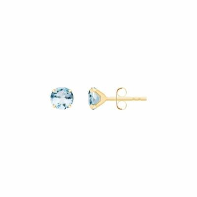 Boucles d'oreilles en or jaune et topaze bleue
