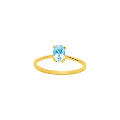 Bague en or jaune et topaze bleue