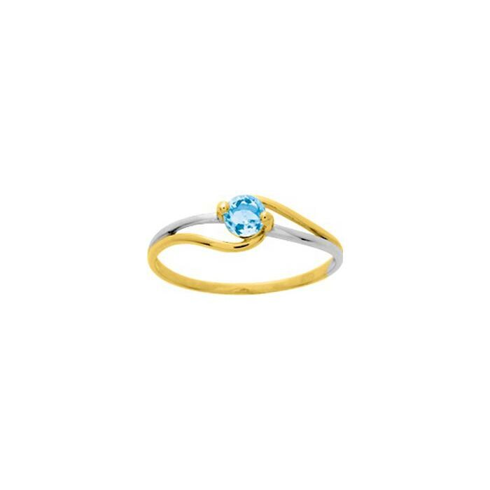 Bague en or jaune, or blanc et topaze