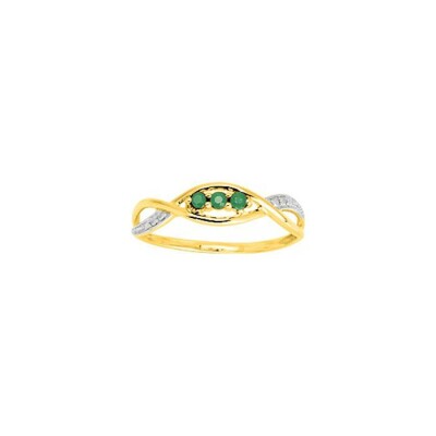 Bague en or jaune rhodié et émeraude