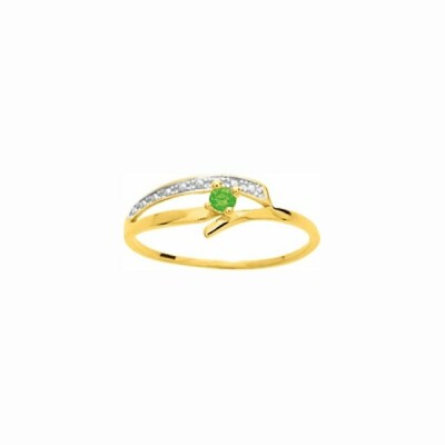 Bague en or jaune, rhodium et émeraude