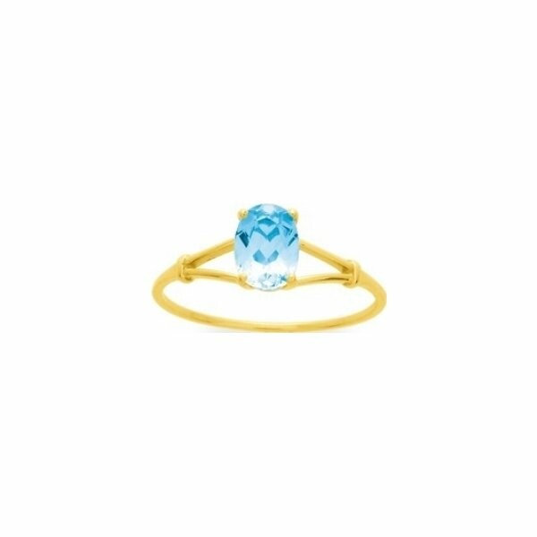 Bague en or jaune et topaze bleue