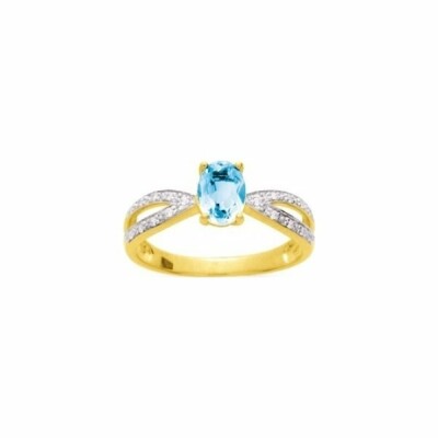 Bague en or jaune, oxydes de zirconium et topaze bleue