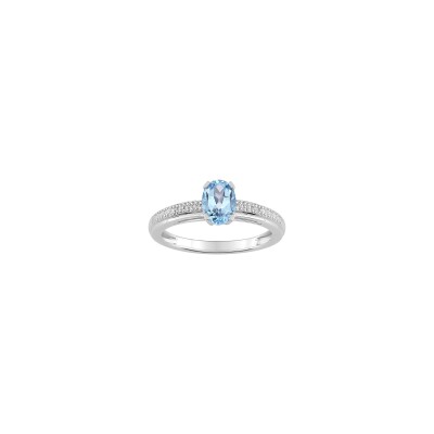 Bague en or blanc, diamant 0.03ct et topaze bleue