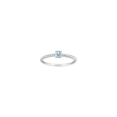 Bague en or blanc et topaze bleue