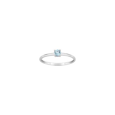 Bague en or blanc et topaze bleue