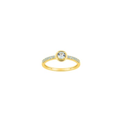 Bague en or jaune et topaze bleue