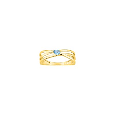 Bague en or jaune et topaze bleue