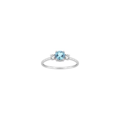 Bague en or blanc, oxyde de zirconium et topaze bleue