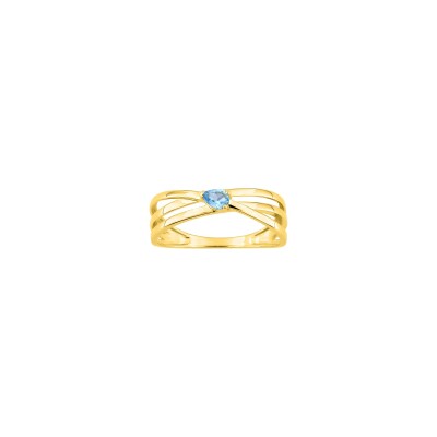 Bague en or jaune et topaze bleue