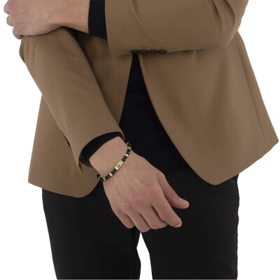 Bracelet Lacoste Matchpoint en acier doré et onyx