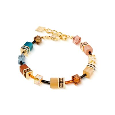 Bracelet Coeur de Lion GeoCUBE Iconic en acier doré, cristaux Swarovski, oeil de tigre et polaris et strass