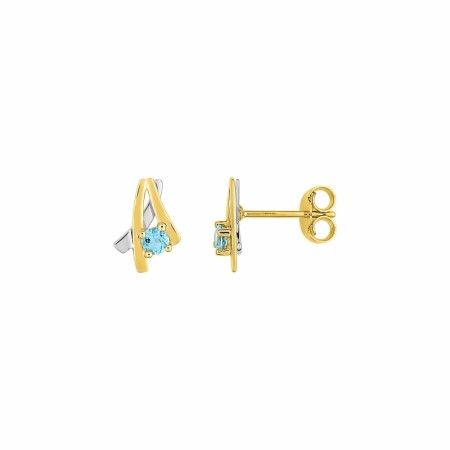 Boucles d'oreilles en or jaune, rhodium et topazes bleues