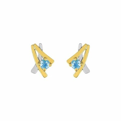 Boucles d'oreilles en or jaune, rhodium et topazes bleues