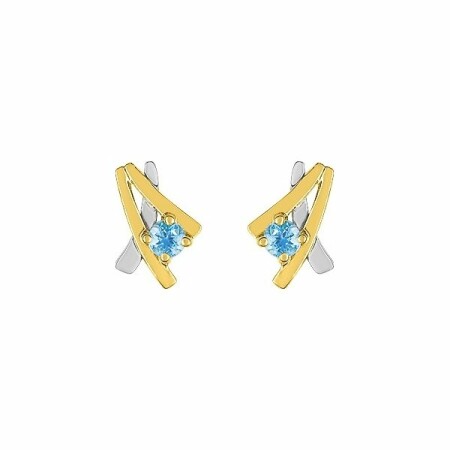 Boucles d'oreilles en or jaune, rhodium et topazes bleues